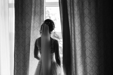 morning of the bride with the creation of the image of makeup and the creation of hairstyles