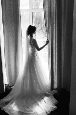 morning of the bride with the creation of the image of makeup and the creation of hairstyles