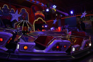 paderborn, northrhine westfalia, germany, october, 27th, 2024, people have fun in a carousel tivoli, clipart