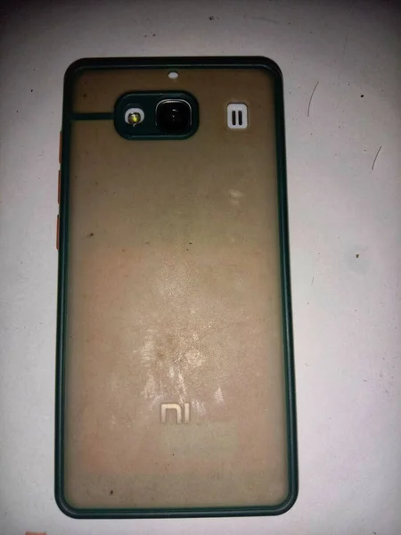 cell phone on white floor