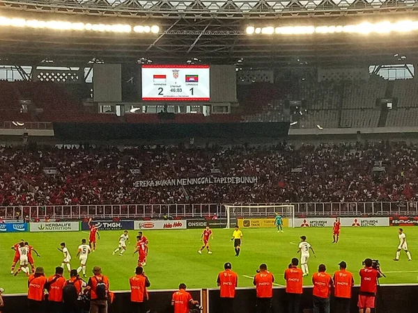 a football match is going on in the stadium