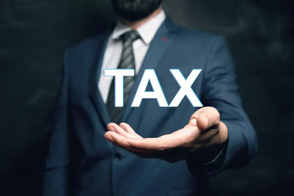 Een Man Houdt Inscriptie Tax Zijn Hand — Stockfoto