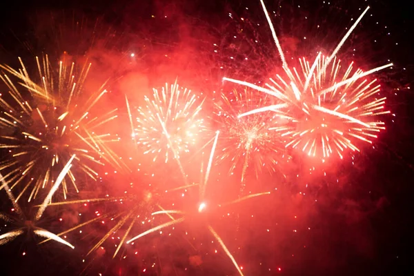 stock image New year red fireworks at night