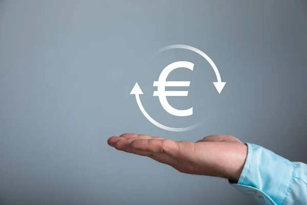 Euro icon in a circle. Man holding in his hand
