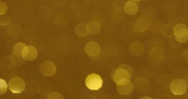 Lüks ve şenlik hissi için koyu Altın Bokeh arka planı