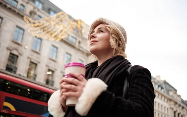 Young Woman Holding Cup Coffee Popular Street London She Has — Foto de Stock