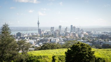 View on central business district with big tower dominating the cityscape, Auckland, New Zealand. clipart