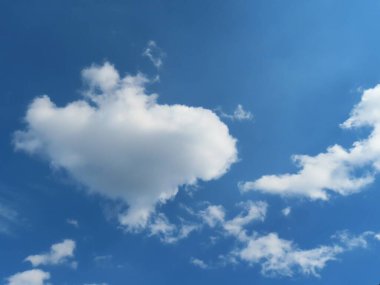 Heart shape cloud in blue sky, natural background