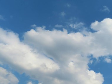 Heart shape cloud in blue sky, natural background