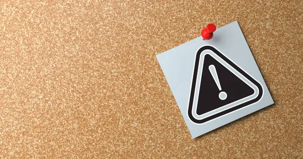 warning sign and exclamation mark on a white background