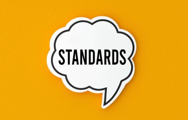 Konuşma balonunda yazılmış standart bir kavram. Sarı arkaplan, resimleme.