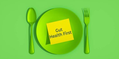 Gut Health ilk mesaj. Yeşil çatal ve kaşık, yeşil tabağın ortasındaki yapışkan not. Yeşil arkaplan 3D görüntüleme