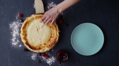 Basque cheesecake with blueberries and raspberries, copy space, overhead view. High quality photo