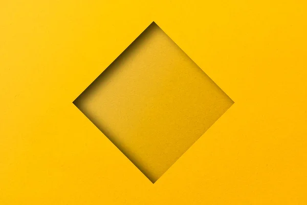 Papel Amarelo Cortado Furos Formas Quadradas São Empilhadas Com Luz — Fotografia de Stock