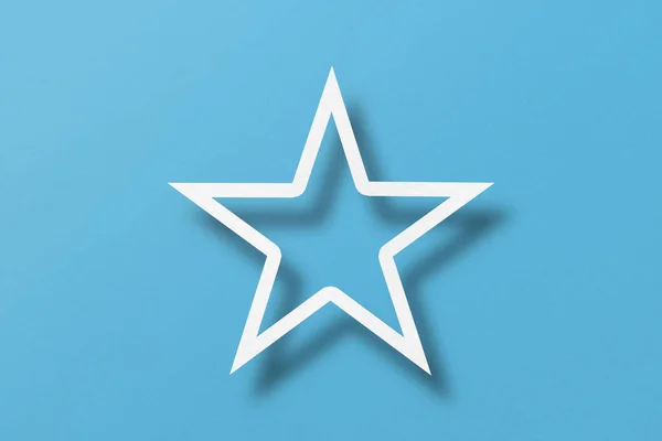 Paper Cut Star Shape Light Shadow Placed Light Blue Paper — Foto Stock
