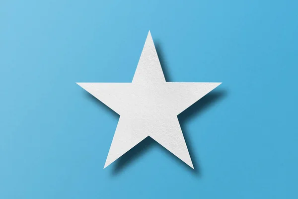 Paper Cut Star Shape Light Shadow Placed Light Blue Paper — Stockfoto