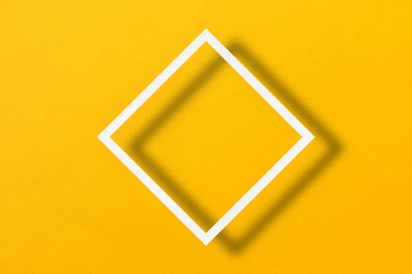 Paper Cut Square Shapes Light Shadow Placed Yellow Paper Background — Stockfoto