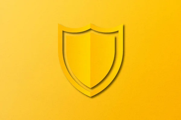 Escudo Papel Amarelo Papel Perfurado Cortar Forma Escudo Definido Fundo — Fotografia de Stock