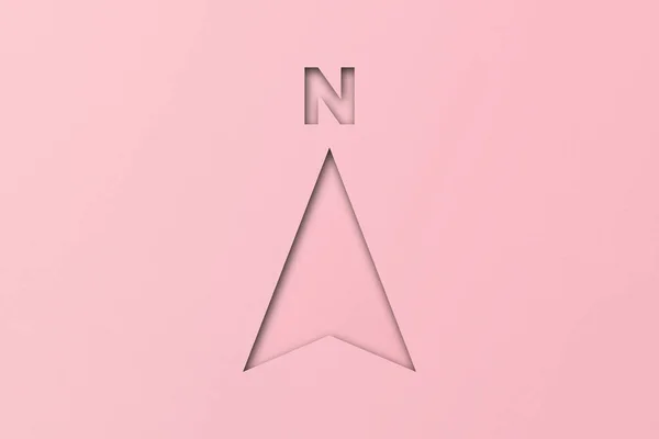 ピンクの紙の背景に設定された北矢印の形でカットピンクの紙 — ストック写真