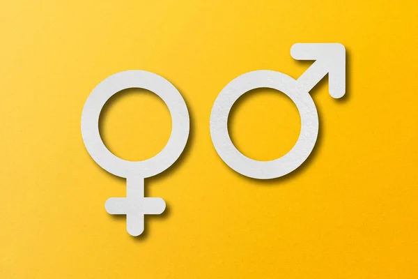 White Paper Cut Male Female Symbol Shapes Set Yellow Background — Stock Photo, Image
