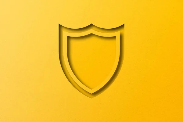 Escudo Papel Amarelo Papel Perfurado Cortar Forma Escudo Definido Fundo — Fotografia de Stock