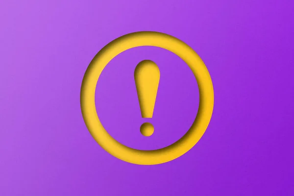 Yellow paper cut into exclamation mark shapes. warning sign set on purple paper background