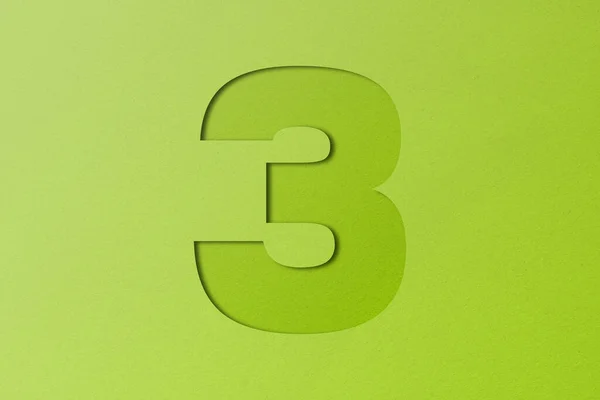白い紙のタイプ紙のアルファベットの数3緑の背景に隔離 — ストック写真