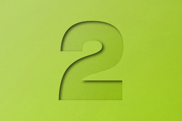 白い紙のタイプ紙のアルファベット番号2緑の背景に隔離 — ストック写真