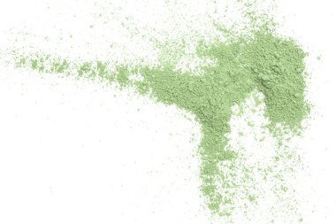Beyaz arkaplanda yeşil toz izole edildi