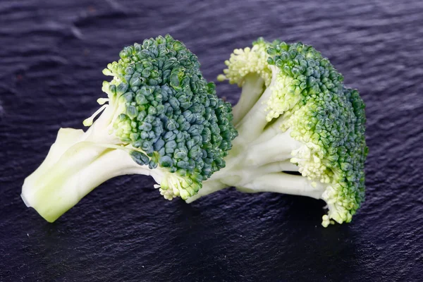 Broccoli isolated isolation on the black SLATE