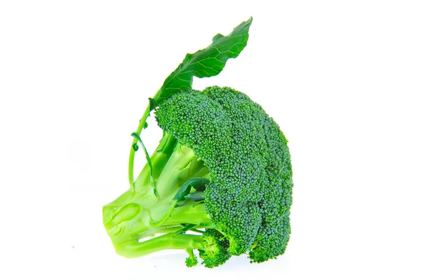 배경에 채소들은 브로콜리를 먹는다 — 스톡 사진