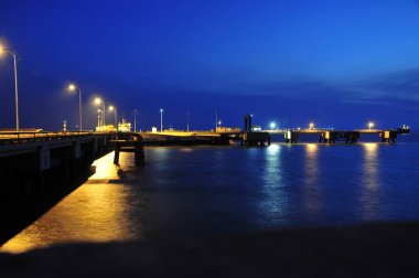 A pier in the evening  clipart