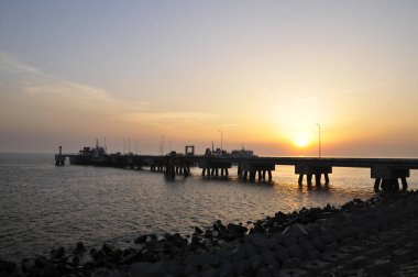 A pier in the evening  clipart