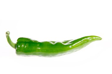 Fresh green chilies on white background