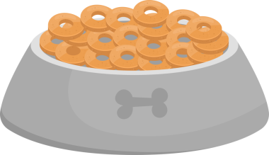 Evcil hayvanlar için tasarlanmış gri bir kase altın yüzük şeklinde abur cuburlarla doludur. Kase bir kemik amblemi içeriyor, köpek dostunun zevki için kullanıldığını ima ediyor..