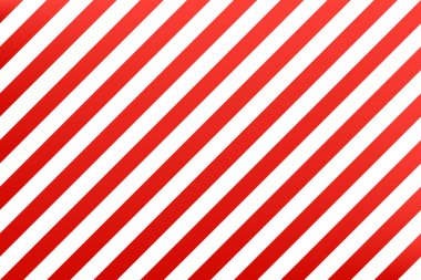 Kırmızı ve beyaz köşegen çizgilerin dinamik deseni. Bu çok yönlü tasarım arka planlar, dekorasyonlar ya da gözü pek, göz alıcı bir etki gerektiren herhangi bir yaratıcı proje için harikadır..