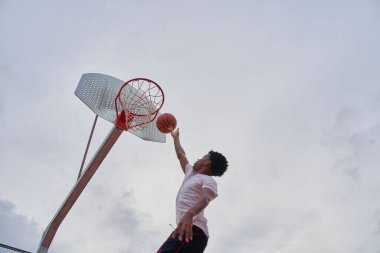 basketball player making slam dunk clipart