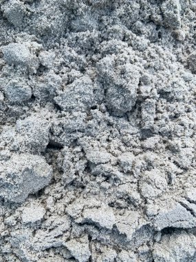 Texture of wet gray sand, background, texture