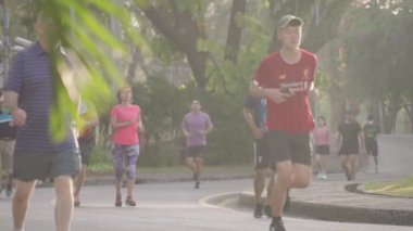 People Exercise Morning Running Jogging at Lumphini Lumpini Lumpinee Park Bangkok, Thailand - Healthy Lifestyle Slow Motion