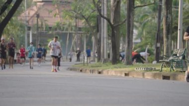 People Exercise Morning Running Jogging at Lumphini Lumpini Lumpinee Park Bangkok, Thailand - Healthy Lifestyle Slow Motion