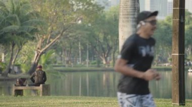 People Exercise Morning Running Jogging at Lumphini Lumpini Lumpinee Park Bangkok, Thailand - Healthy Lifestyle Slow Motion