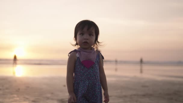 Happy Indonesian Toddler Walking Dancing Laughing Enjoying Sunset Beach — Stockvideo