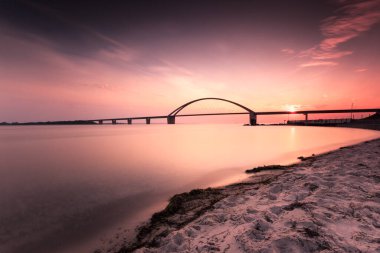 Sahilde gün batımı, Fehmarn