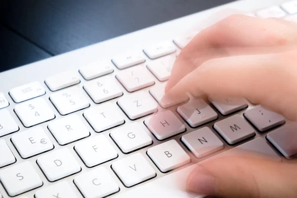 Close Person Hand Typing Keyboard Royalty Free Stock Photos