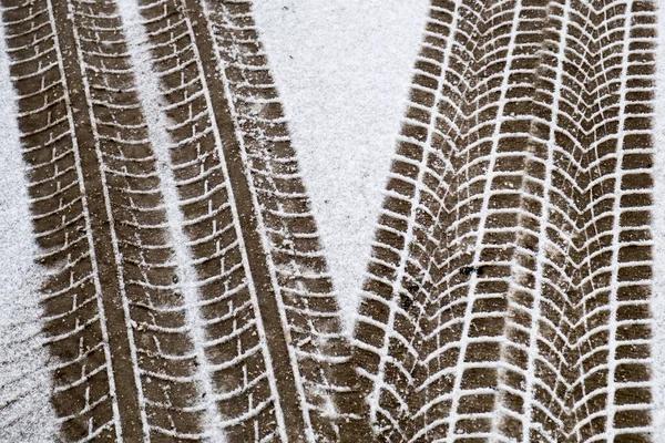 car tires on the snowy road