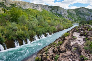 The Confluence of Neretva and Buna River have remarkable river gorge along with tufa waterfalls, Mostar, Bosnia and Herzegovina clipart