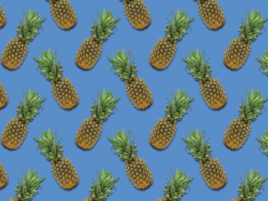Pineapple fruits pattern on blue background. Colorful and delicious fruit for wallpapers