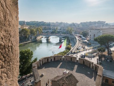 10 07 2023; Rome, Italy: View of Rome and Tiber (or Tevere) River from Saint Angelo Castle with italian flag waving. clipart