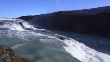 Gullfoss waterfall in Hvt river canyon in southwest Iceland. Popular falls on the Golden Circle tourism route. View from the top of second stage. 