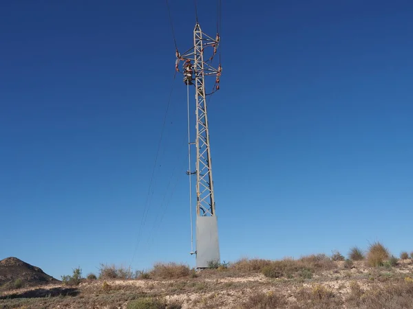 stock image electricity pylon in the desert 